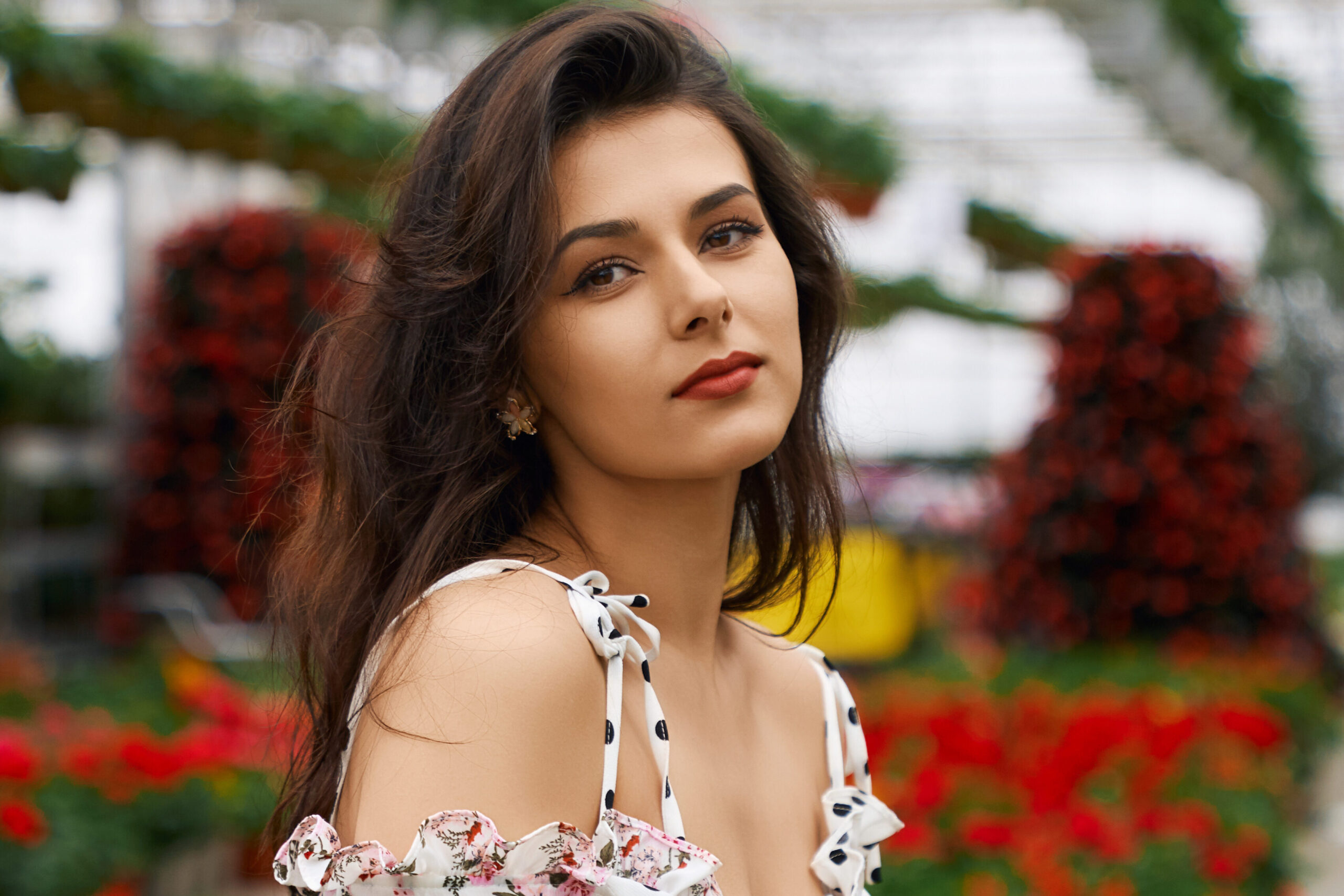 service-3 attractive woman in stylish dress posing at orangery