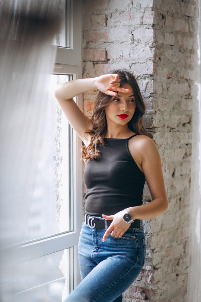 What to Check Before Booking a Call Girl in Indore? booking call girl in indore - portrait of young happy woman in studio
